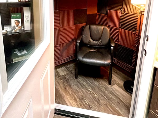 Interior photo of the sound testing booth for the AudioNova hearing clinic in Leesburg, FL on Highway 27