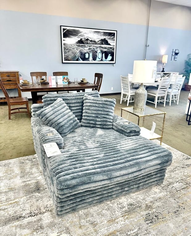 Franklin Living Collection oversized chaise lounge on display at Slumberland Furniture Burlington. Ultra-soft, cozy, and stylish—perfect for relaxing in comfort. Shop high-quality, American-made Franklin furniture in Southeast Iowa. 