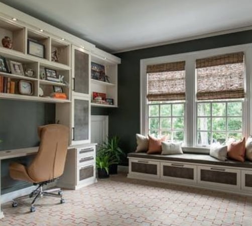 Cozy Home office with an inviting bench for additional seating by California Closets Charlotte, North Carolina.
