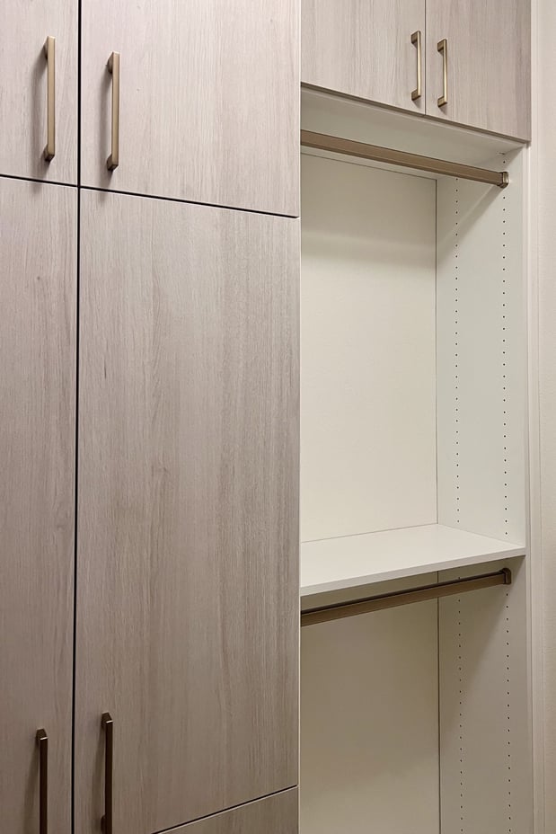 Custom walk in closet with wardrobe California Closets New Orleans & Gulf Coast in Metairie, Louisiana