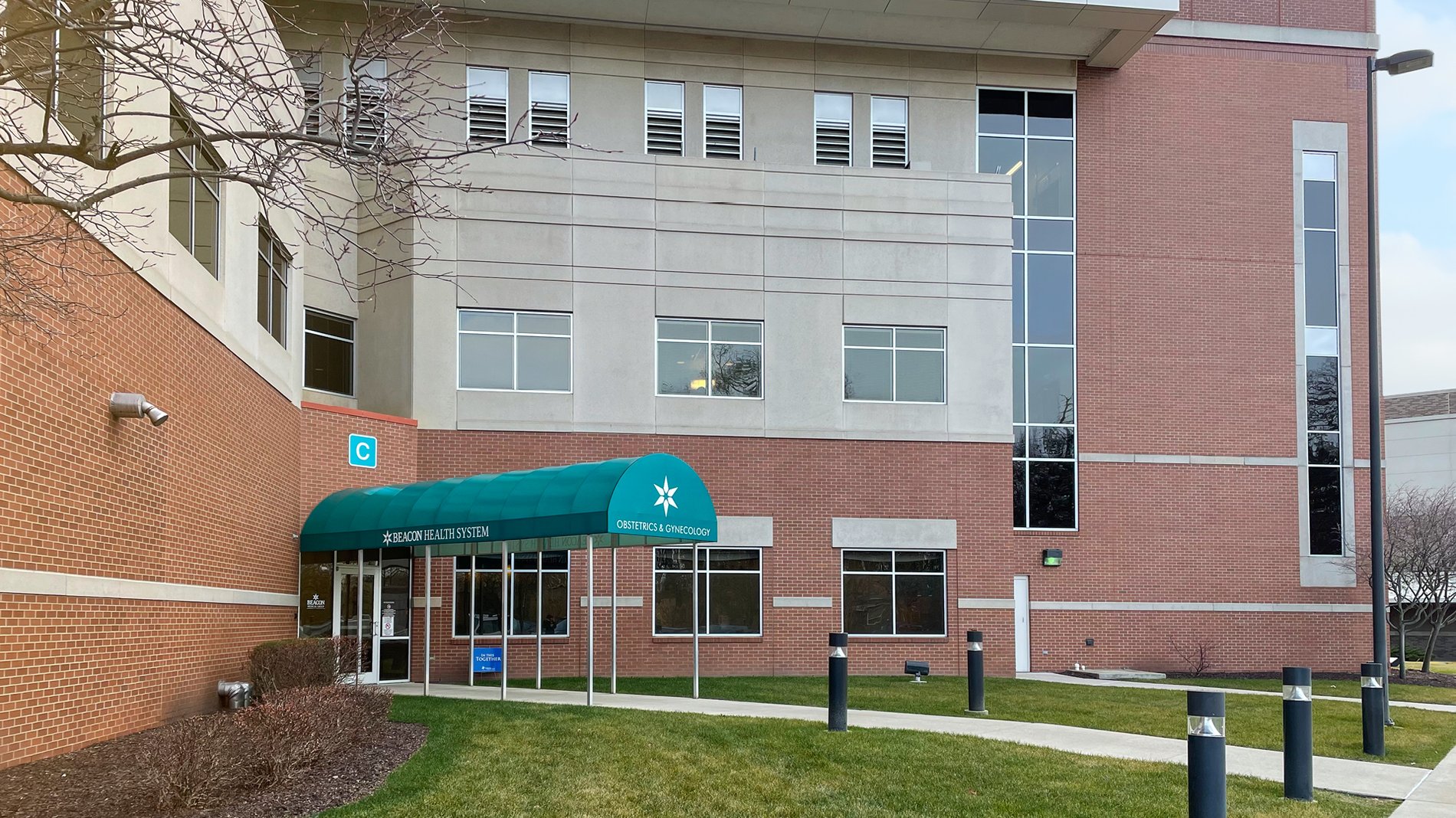 Entrance C at Elkhart General Hospital has a teal awning that welcomes patients for obstetrics and gynecology.