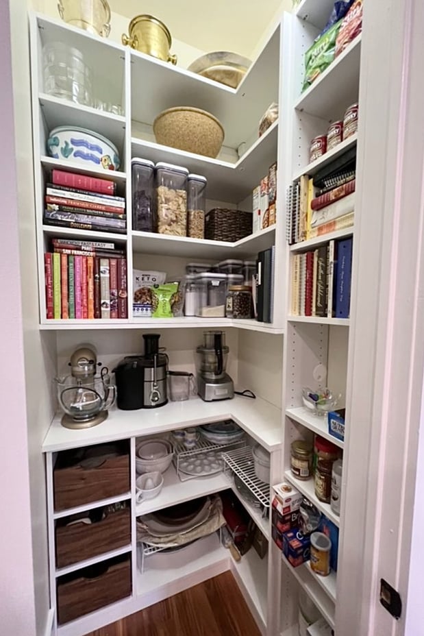 Custom closet shelving for a pantry with cabinets California Closets Gulfport & Hattiesburg