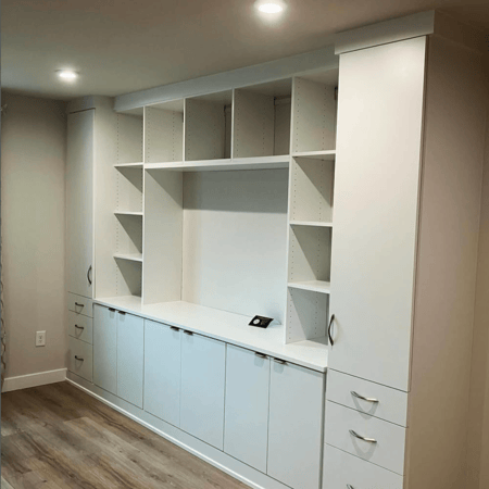 White multi-purpose storage system with shelves and drawers.