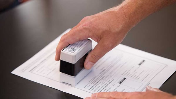 document being notarized at the ups store