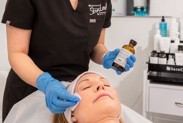 Patient receiving a facial from provider at SkinLab CSI Palm Desert.