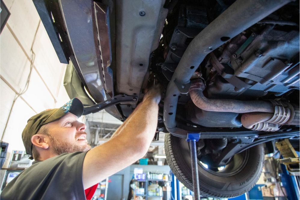 Picture of technician working under a car at Grease Monkey Bell Road location in Phoenix