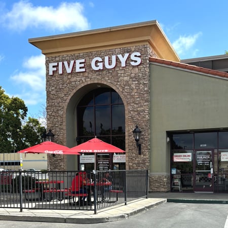 Exterior photograph of the Five Guys restaurant at 19621 Hesperian Boulevard in Hayward, California.