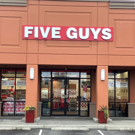 Exterior photograph of the Five Guys restaurant at 755 NW Gilman Boulevard in Issaquah, Washington.