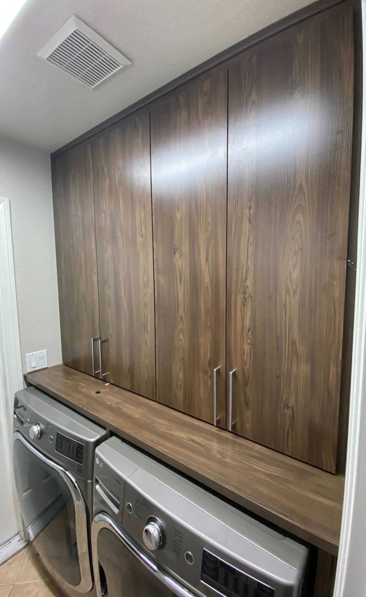 custom built laundry cabinets