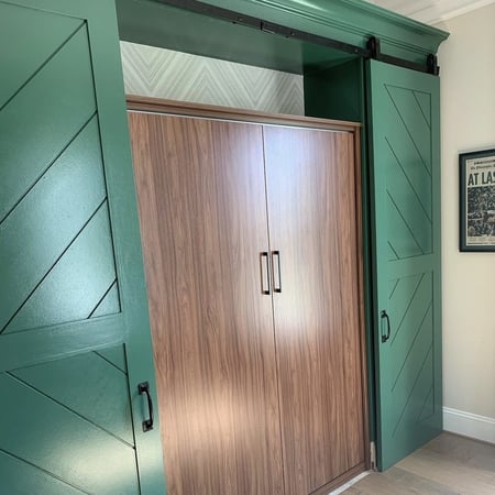 Closet organization system with murphy style beds in a wall California Closets Pensacola & Panama City, FL