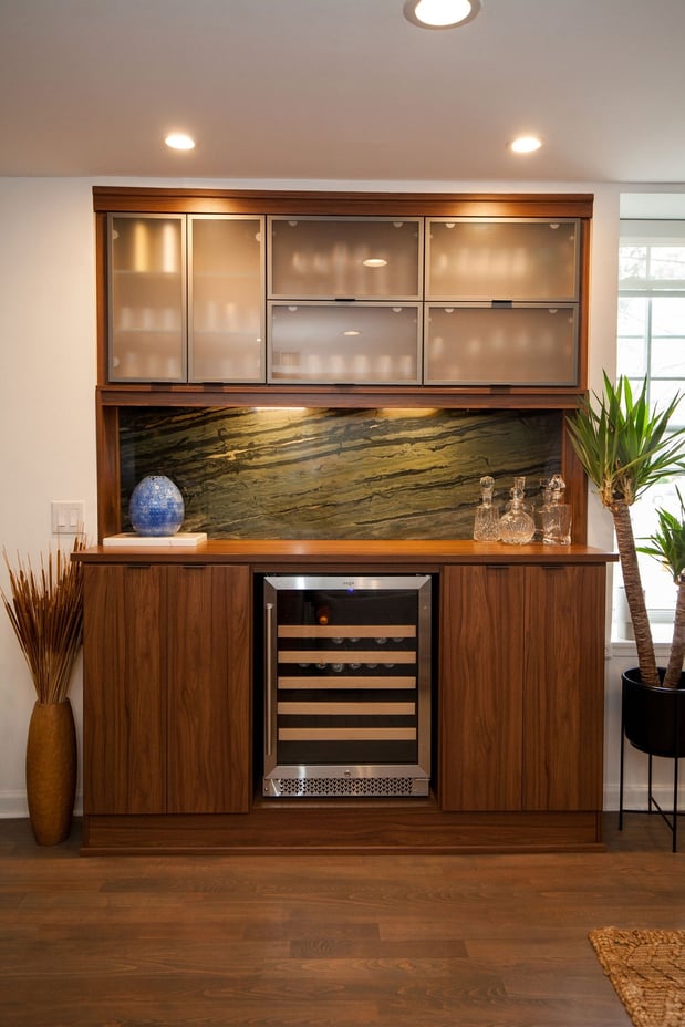 Custom Wine Bar with Decorative Backsplash, Wine Fridge, and Frosted Glass Doors in Downingtown, Pennsylvania by California Closets of Philadelphia and Delaware