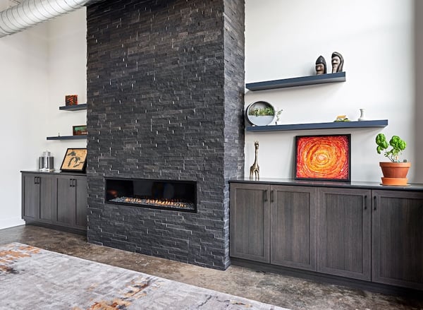 Custom storage, built-in cabinets, shelving, wall unit, home organization, fireplace surround, California Closets Northern Michigan