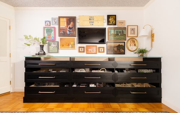 custom open top drawers with wall art and dark wood