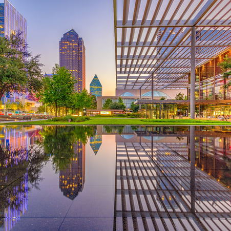 Dallas, Texas, USA downtown plaza and skyline.