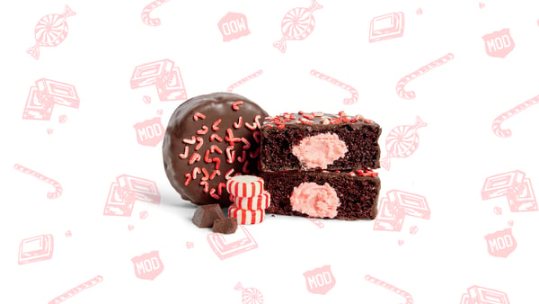 Our new Chocolate Peppermint No Name Cake: inside the cake is a peppermint cream filling and outside it's covered in dark chocolate and candy cane sprinkles.