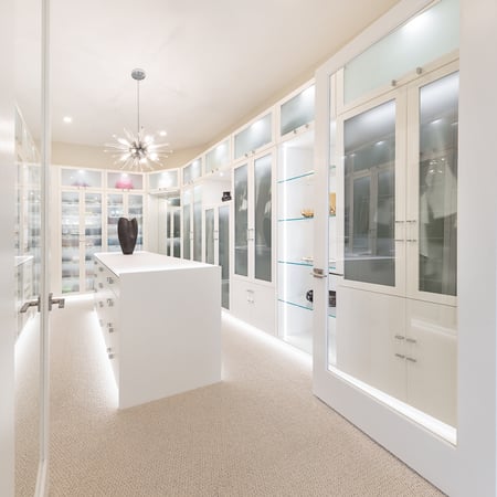 Floor to ceiling storage and a centre island for maximize storage.