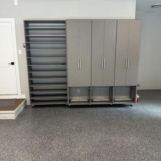 Richmond - Custom closets - garage storage system with tall cabinets, adjustable shelving, and pull-out wire baskets