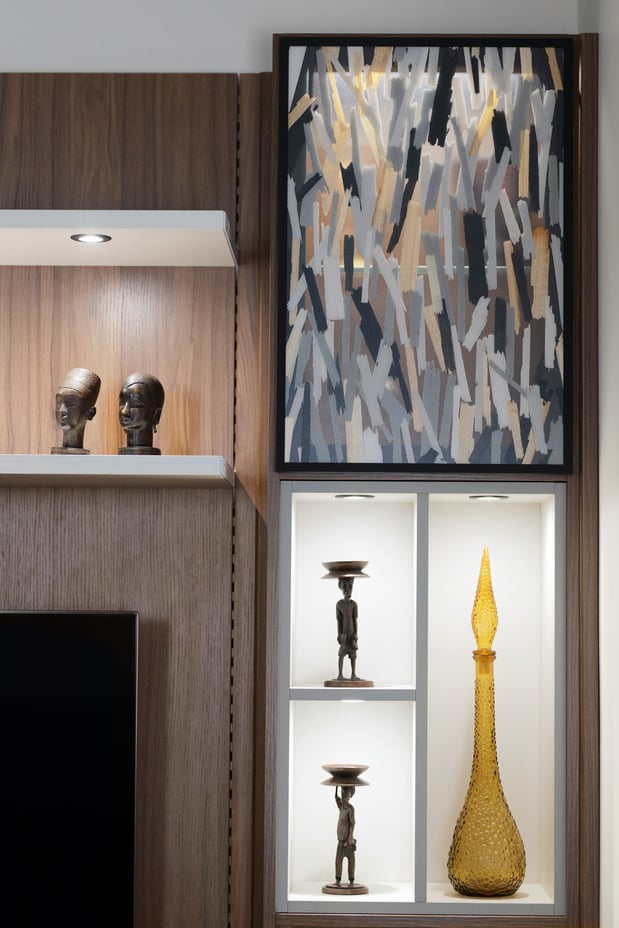 Floating shelves and unique cubbies are the perfect place to display special items. Add some texture with our eco resin door inserts and lighting for highlights.