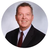A headshot image of Joe Cavanaugh.