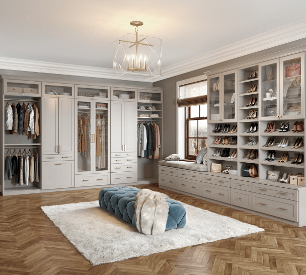 Custom Walk-In Closet Floor-to-Ceiling Built-In Cabinetry Glass Front Doors Shoe Storage Wall Drawer Storage Hanging Sections Center Bench Seating by California Closets South Palm Beach Florida