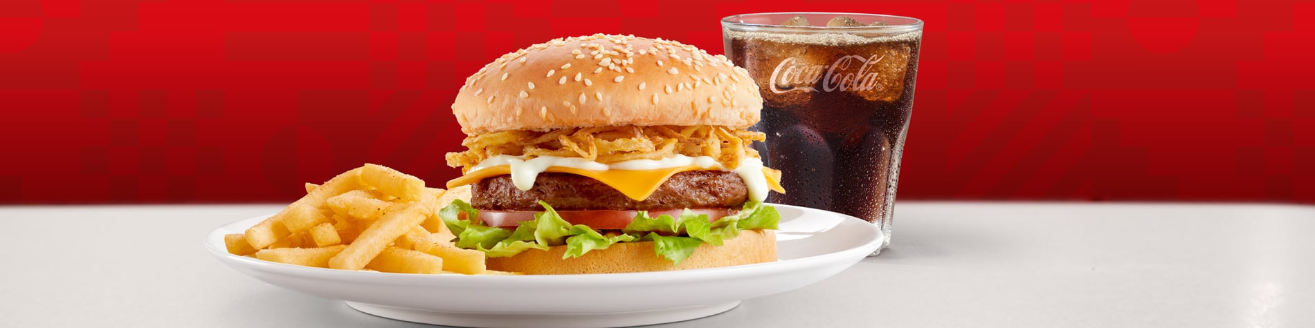 A cheeseburger with mayo, crispy onion rings, a regular portion of chips and a FREE Small Coke.