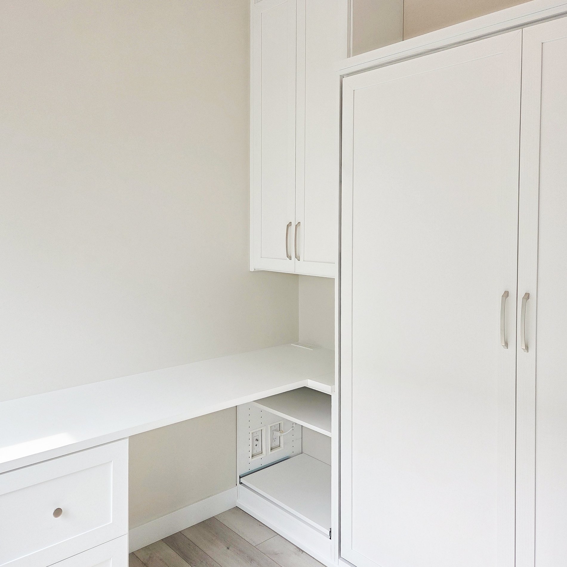 California Closets desk and wall bed design in a white finish.