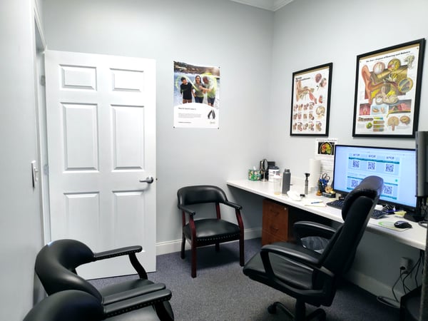 Interior photo of the consultation office for AudioNova hearing clinic in Jupiter, FL