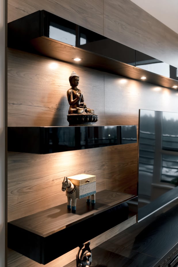 Angle view of floating display shelves with built in lighting