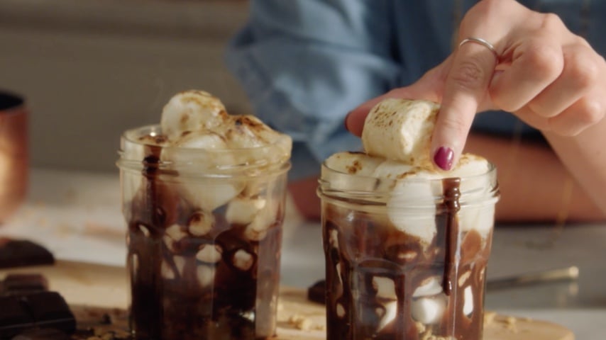 Jars with Baileys S’mores and marshmallows on top