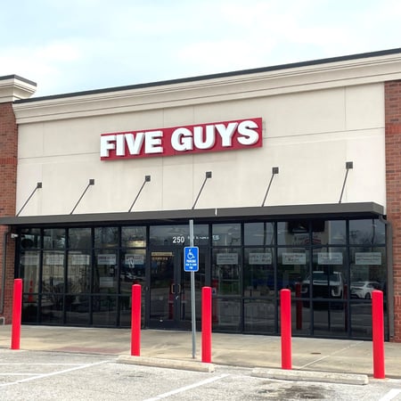 Exterior photograph of the Five Guys restaurant at 250 N. Highway 67 in Florissant, Missouri.