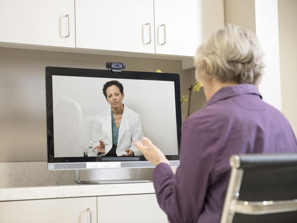 Woman on video chat with a medical professional