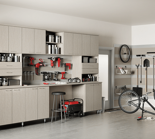 Modern grey garage workspace storage with custom storage and red tools