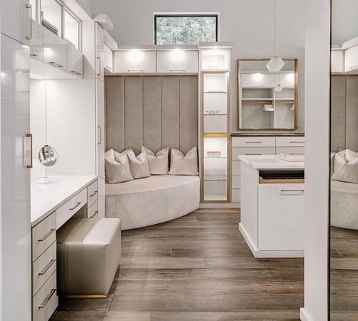 luxe white walk-in closet with center island