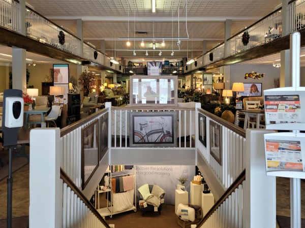 Slumberland Furniture Store in Devils Lake,  ND - Showroom main staircase