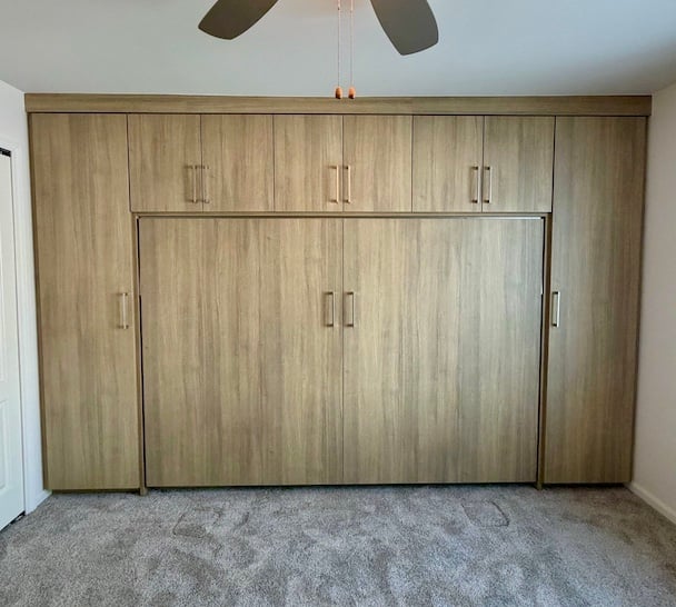 Custom murphy bed and wall bed with built-in closets and storage solutions for optimized home organization in Dexter, Michigan