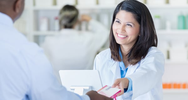 pharmacist helping a customer