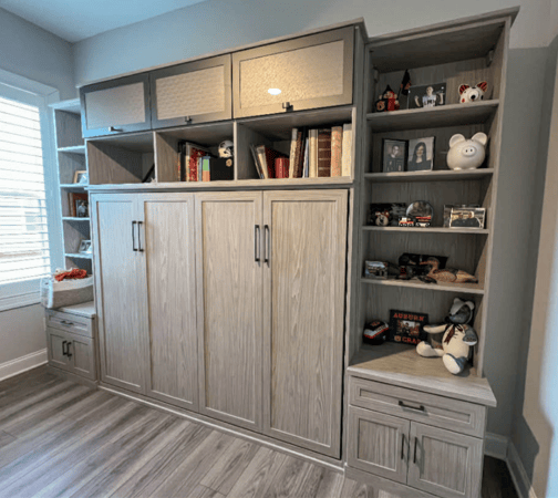 light wood grain wall bed with book shelving