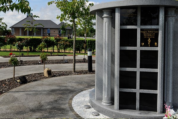 Mausoleum standing in the grounds of a cemetery