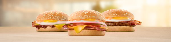 Breakfast buns with bacon egg cheese and beef patty