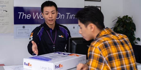 FedEx employee, package and customer