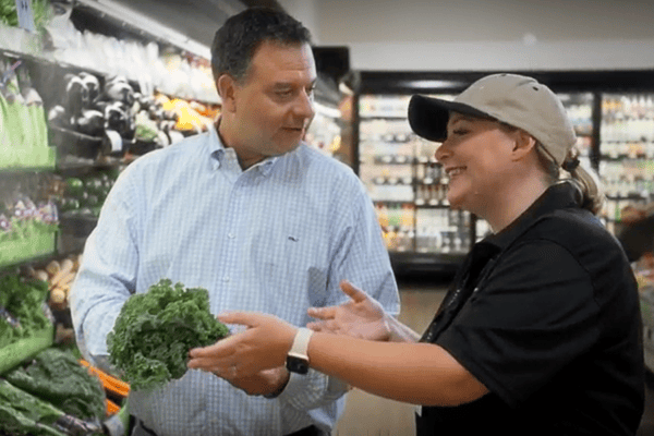 Produce manager and customer