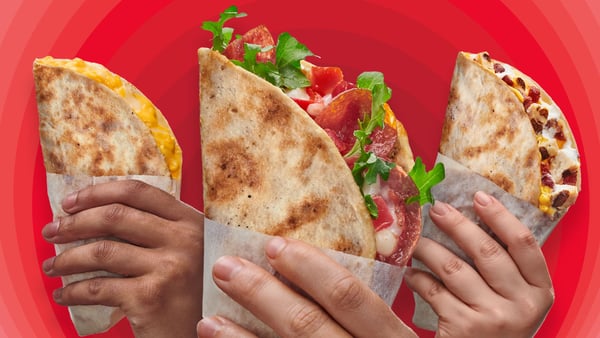 Three hands holding our new Pocket Pie flavors Italiano, Chicken Bacon Ranch, and Four Cheese.