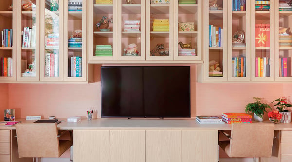 custom home office with shelving and cabinetry by California Closets