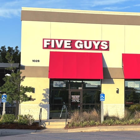 An exterior photograph of the Five Guys restaurant at 1028 Marble Terrace Street in Hoover, Alabama.