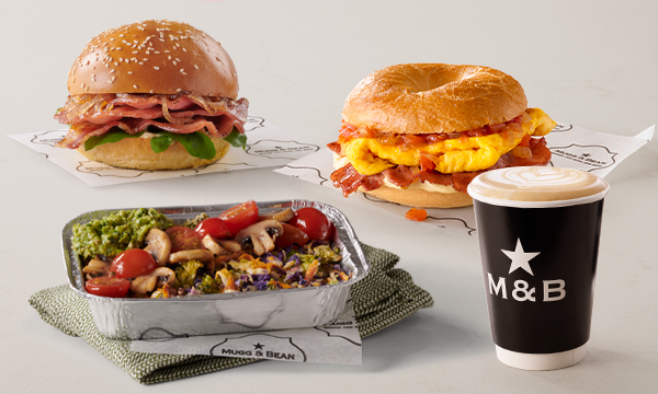 macon Bun, Breakfast Bagel with bacon and scrambled egg, takeaway Cappuccino, and Veg Rosti with Pea Pesto vegan breakfast from Mugg & Bean On-The-Move.