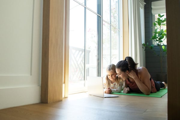 Mother and daughter doing yoga while using WiFi 360