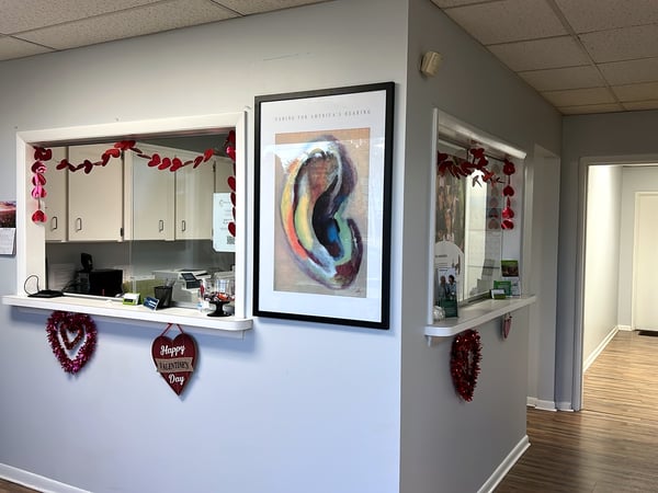 Interior photo of the reception desk for AudioNova hearing clinic in Tavares, FL