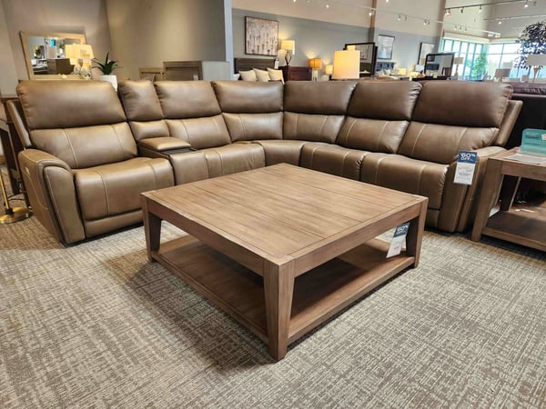 West Des Moines Slumberland leather reclining sectional with coffee table