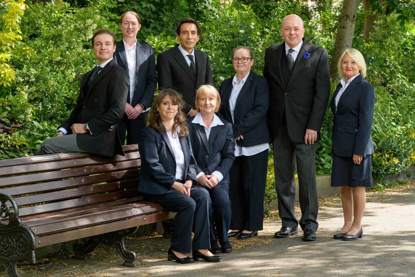 The team from JH Kenyon Funeral Directors in north London gather together at a local north London park