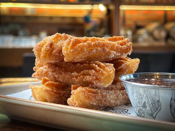 Small Churros on a plate